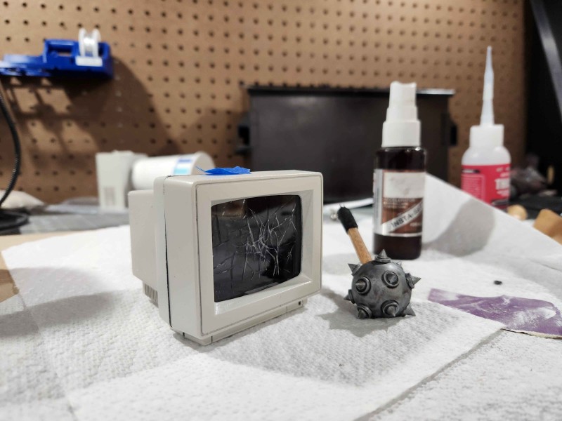 The broken monitor with the giant mace that shattered the screen.