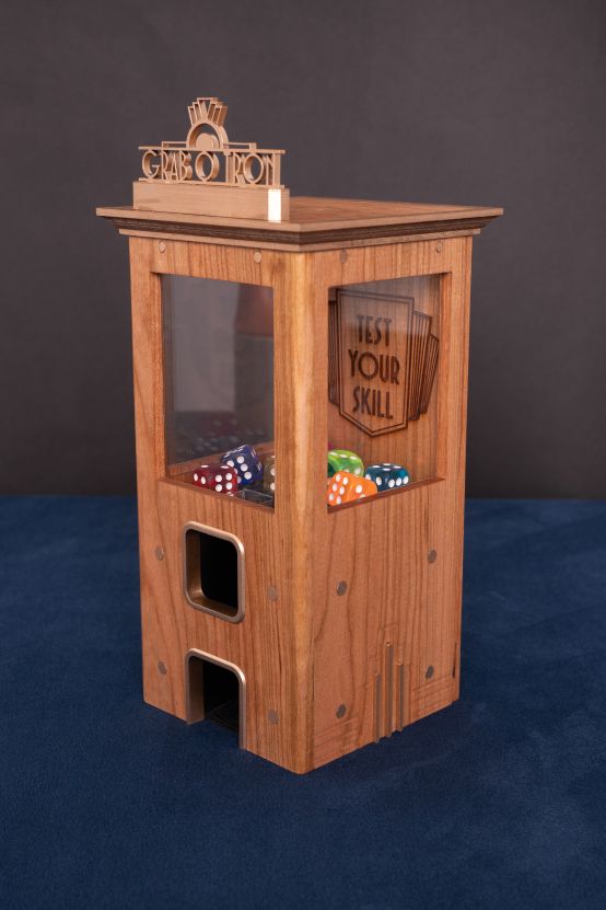 Action shot claw machine dice tower