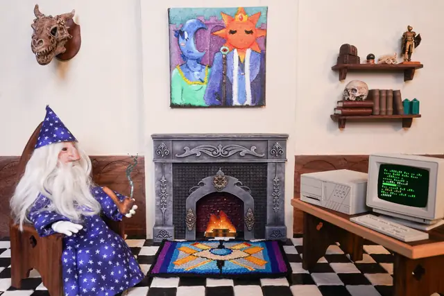 A wizard relaxing by his PC in front of a fireplace